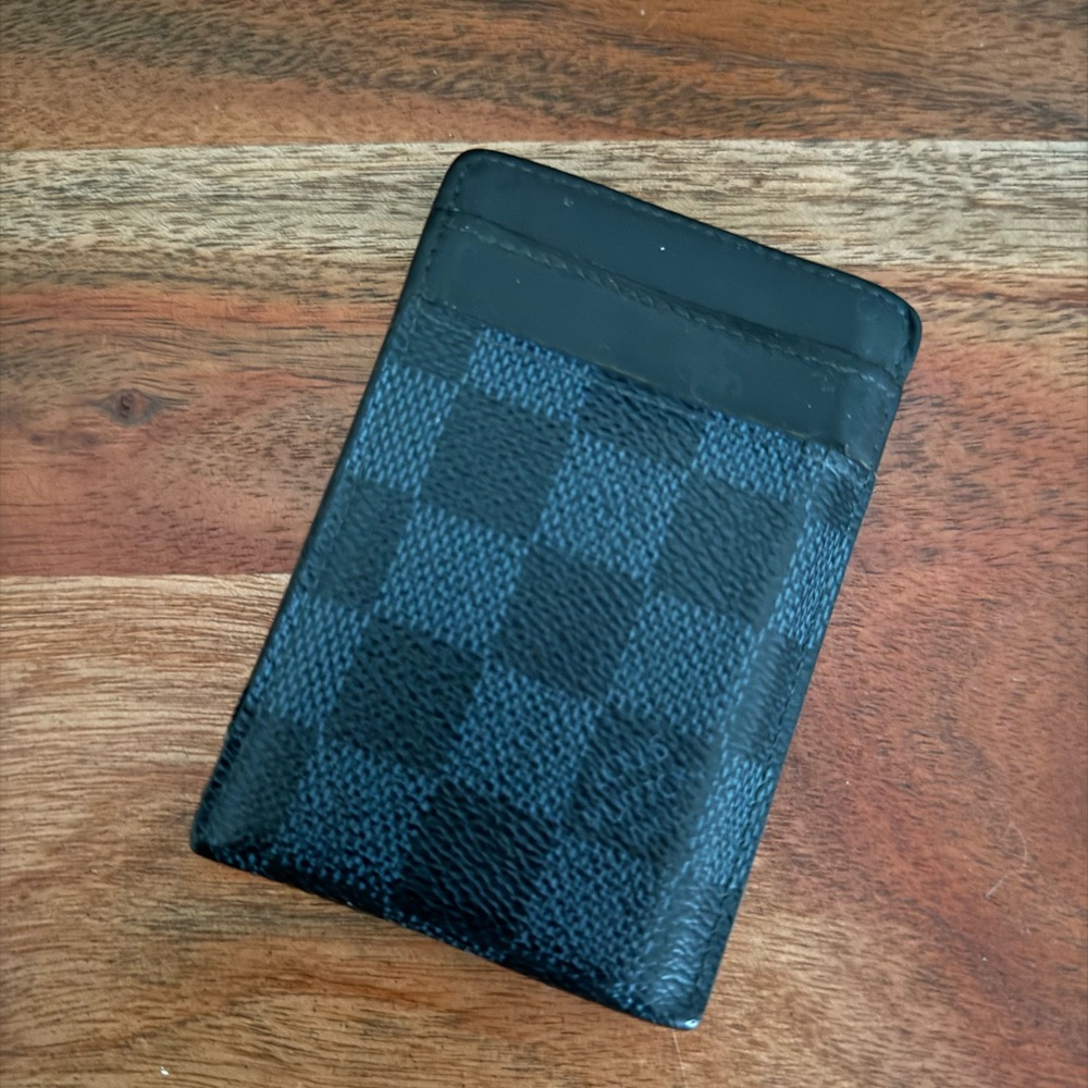 Louis Vuitton cardholder with money clip.